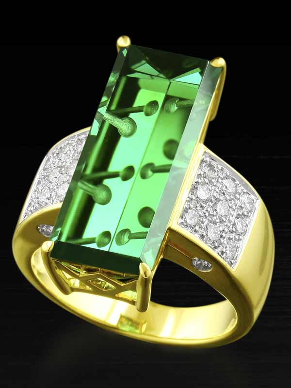 Fantasy cut tourmaline in a designer gold and diamond ring