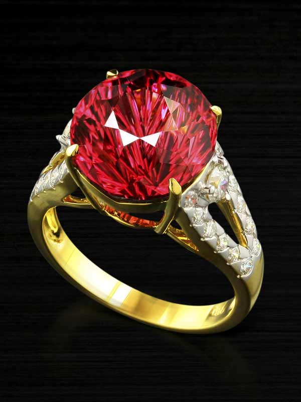 Fantasy cut umbalite garnet in a designer gold and diamond ring